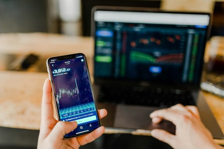 Investor reviewing portfolio charts and market information